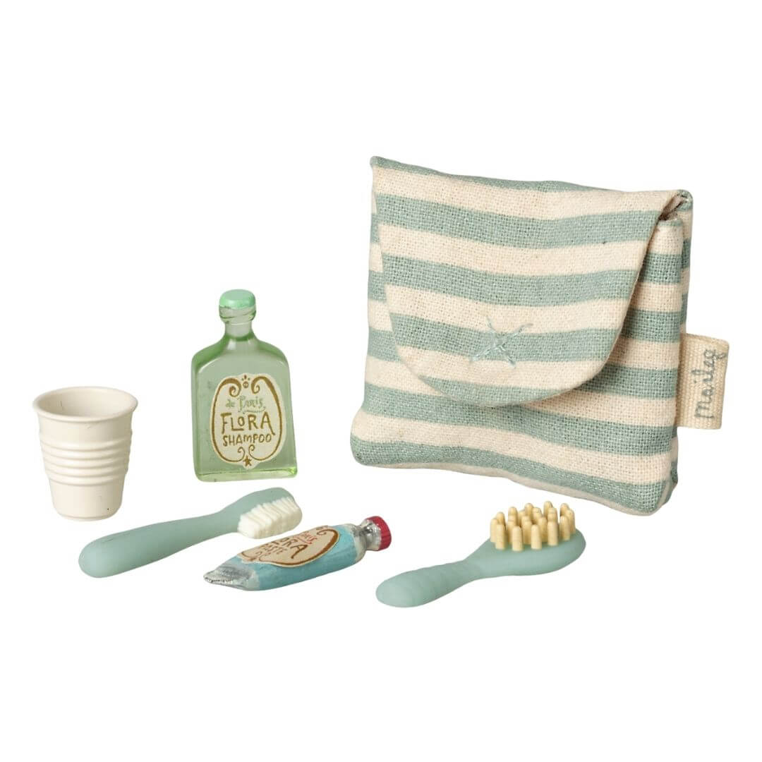 Maileg mouse-sized toothbrush set with striped fabric pouch, including toothbrushes, toothpaste, cup, and bottle for imaginative daily care play - Bella Luna Toys